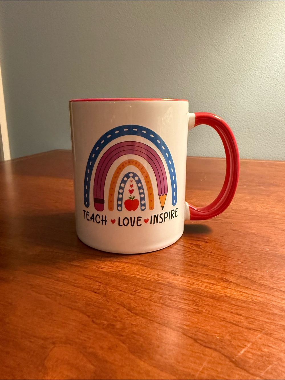 Teach Love Inspire Rainbow Ceramic Mug - Red Handle